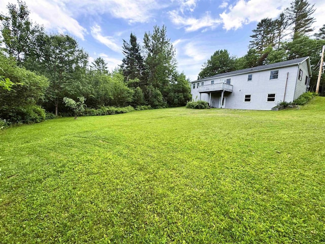 257 Crane St, Littleton, NH 03561 - view of grassy yard featuring a wooden deck