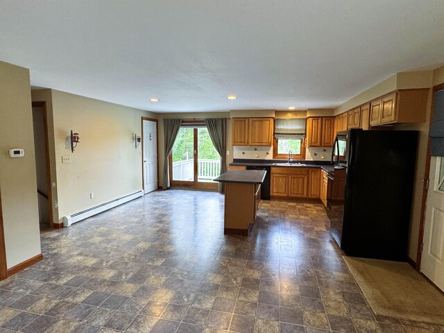 257 Crane St, Littleton, NH 03561 - kitchen featuring baseboard heating, black appliances, dark countertops, recessed lighting, and a center island