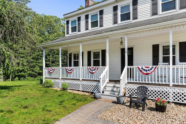11 Parkside Dr, Pelham, NH 03076 - farmhouse inspired home with a porch, a chimney, and a front yard