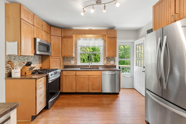 11 Parkside Dr, Pelham, NH 03076 - kitchen featuring stainless steel appliances, tasteful backsplash, and light wood finished floors