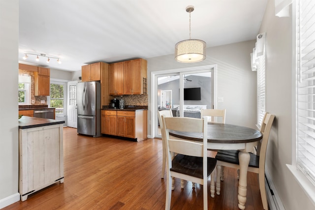 11 Parkside Dr, Pelham, NH 03076 - dining room with light wood-style flooring