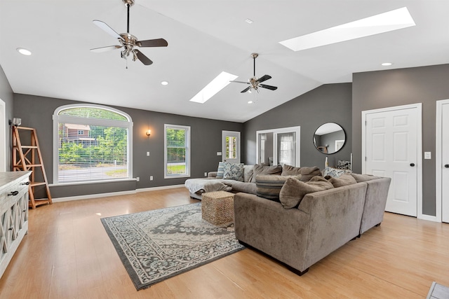 11 Parkside Dr, Pelham, NH 03076 - living area with a skylight, vaulted ceiling, ceiling fan, light wood finished floors, and recessed lighting