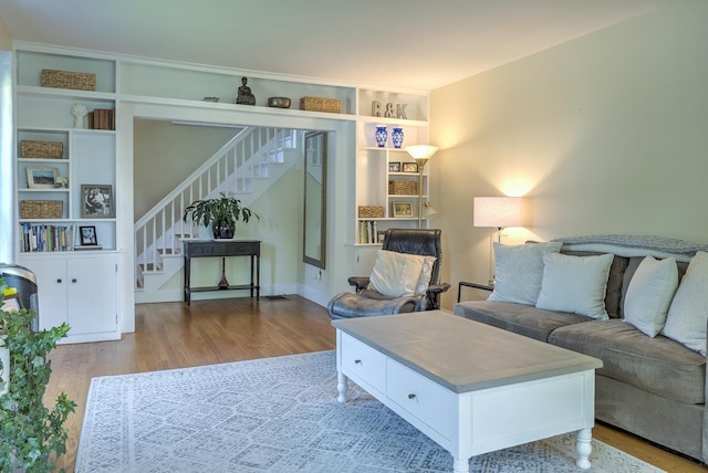 67 Pine Ave, Keene, NH 03431 - living room featuring wood finished floors, stairway, and built in features