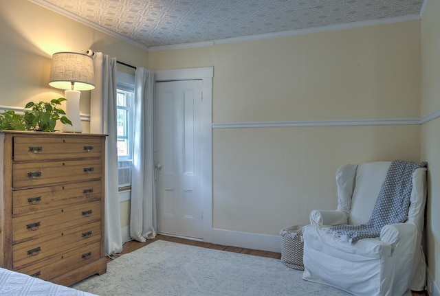 67 Pine Ave, Keene, NH 03431 - sitting room featuring an ornate ceiling, crown molding, and wood finished floors