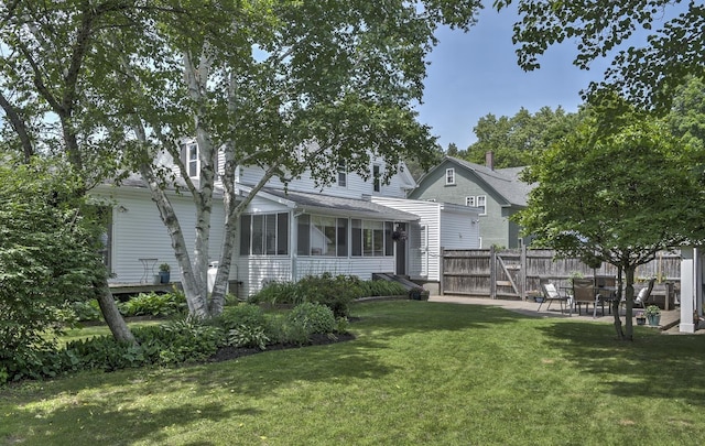 67 Pine Ave, Keene, NH 03431 - back of house featuring a patio and a shingled roof