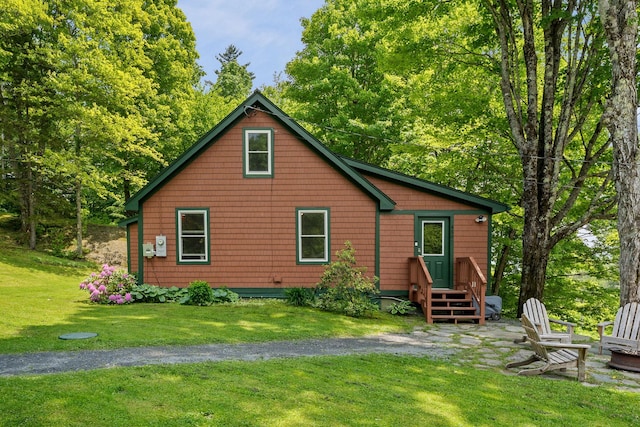 450 Ryan Rd, Duxbury, VT 05676 - rear view of house with a yard