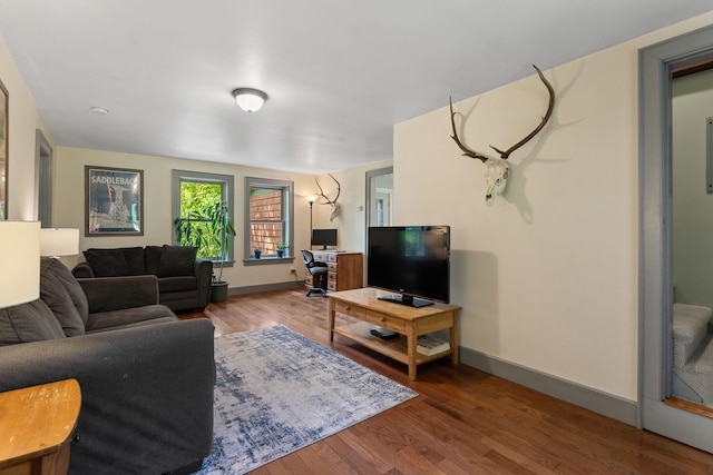 450 Ryan Rd, Duxbury, VT 05676 - living room featuring wood finished floors and a desk