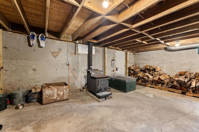 450 Ryan Rd, Duxbury, VT 05676 - unfinished basement featuring a wood stove