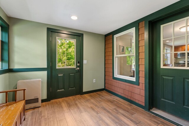 450 Ryan Rd, Duxbury, VT 05676 - entrance foyer with heating unit, wood finished floors, and recessed lighting