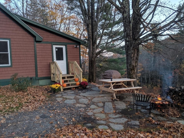 450 Ryan Rd, Duxbury, VT 05676 - view of patio / terrace featuring a fire pit