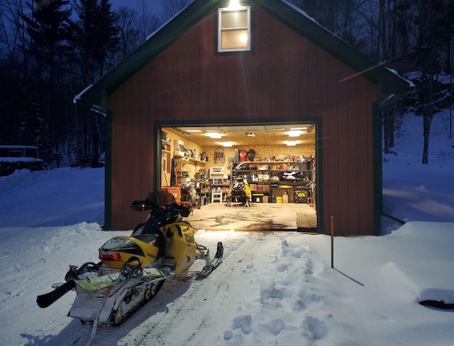 450 Ryan Rd, Duxbury, VT 05676 - snow covered garage with a detached garage