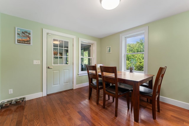 450 Ryan Rd, Duxbury, VT 05676 - dining area with healthy amount of natural light and dark wood finished floors