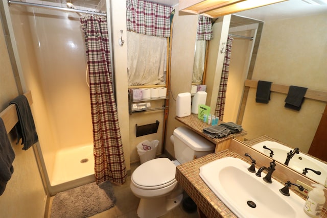 79 Huckleberry Ln Unit 19, Warren, VT 05674 - bathroom with a shower stall, tile patterned flooring, and vanity