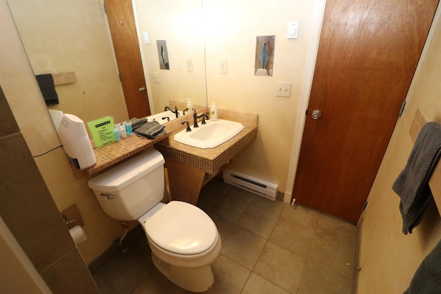79 Huckleberry Ln Unit 19, Warren, VT 05674 - bathroom featuring baseboard heating and tile patterned flooring