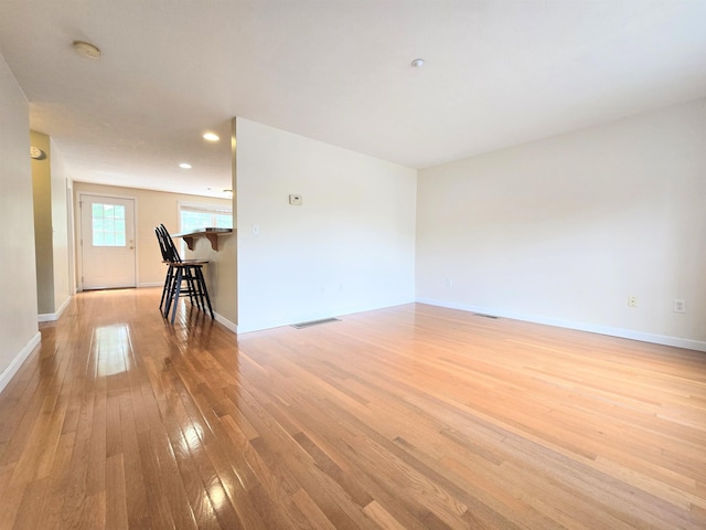 69 Mulberry St Unit 3, Concord, NH 03301 - unfurnished living room featuring light wood-type flooring and recessed lighting