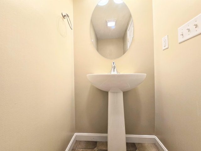 69 Mulberry St Unit 3, Concord, NH 03301 - bathroom with baseboards and tile patterned flooring