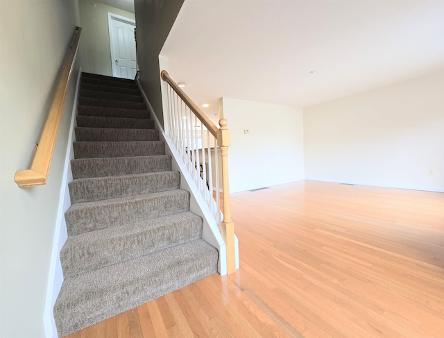 69 Mulberry St Unit 3, Concord, NH 03301 - stairway with wood finished floors