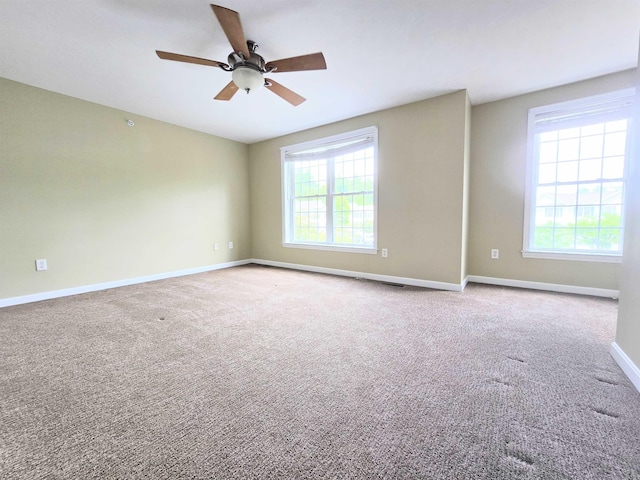 69 Mulberry St Unit 3, Concord, NH 03301 - carpeted empty room featuring ceiling fan and baseboards