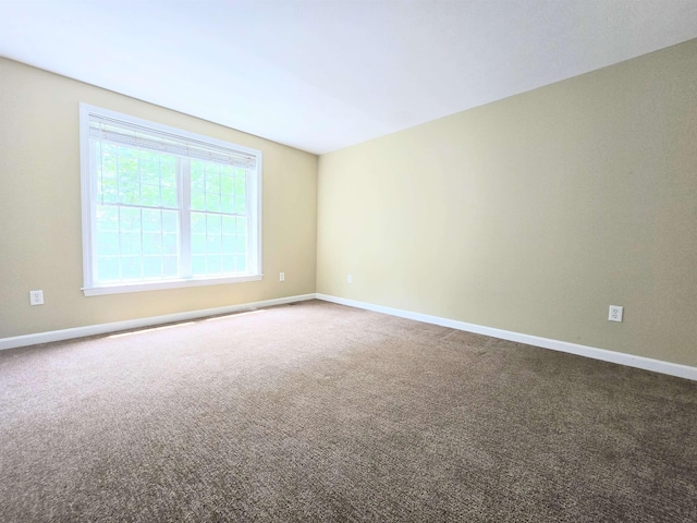 69 Mulberry St Unit 3, Concord, NH 03301 - carpeted empty room featuring baseboards