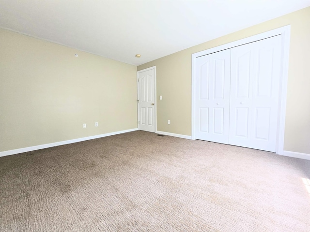 69 Mulberry St Unit 3, Concord, NH 03301 - unfurnished bedroom featuring carpet floors and a closet