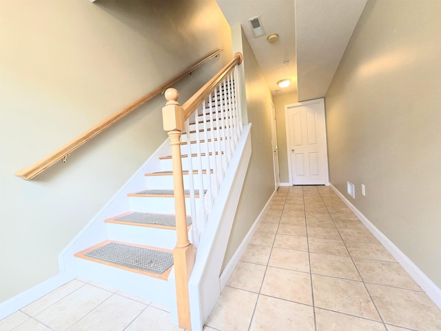 69 Mulberry St Unit 3, Concord, NH 03301 - stairway featuring tile patterned flooring and baseboards