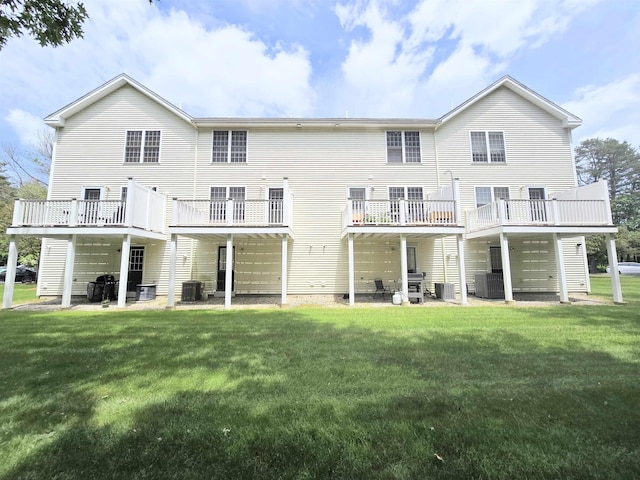 69 Mulberry St Unit 3, Concord, NH 03301 - rear view of property featuring a lawn