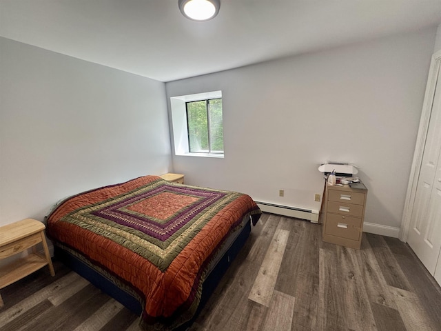 68 Franklin Hts, Rochester, NH 03867 - bedroom with baseboard heating and wood finished floors