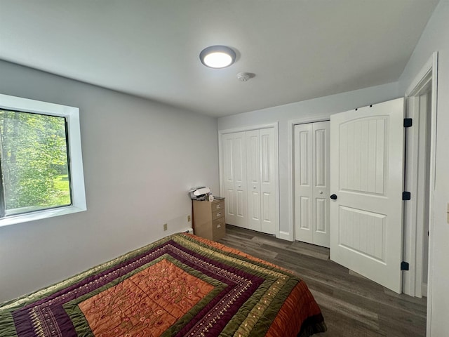 68 Franklin Hts, Rochester, NH 03867 - bedroom with two closets and dark wood-type flooring