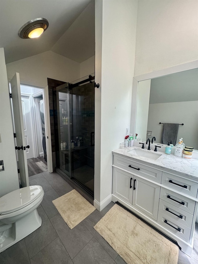 68 Franklin Hts, Rochester, NH 03867 - full bathroom with vaulted ceiling, vanity, a stall shower, and tile patterned floors