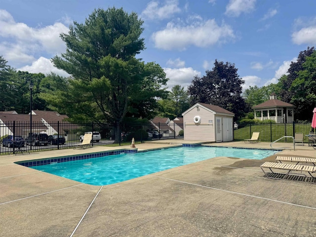 68 Franklin Hts, Rochester, NH 03867 - community pool featuring a patio