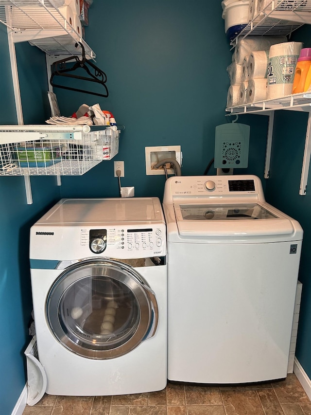 81 Cider St, Epping, NH 03042 - washroom with washing machine and dryer and baseboards