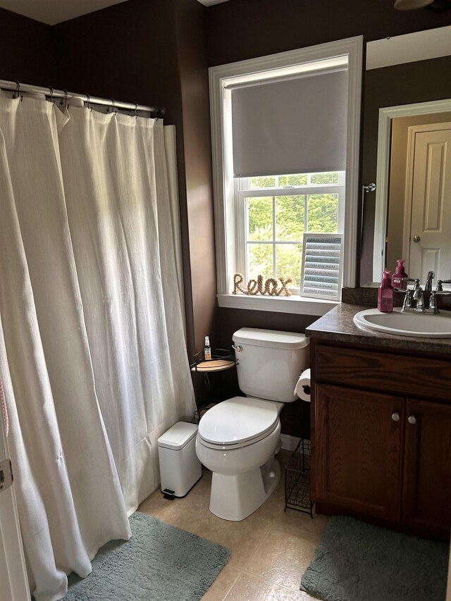 81 Cider St, Epping, NH 03042 - full bathroom featuring vanity, tile patterned flooring, and a shower with shower curtain