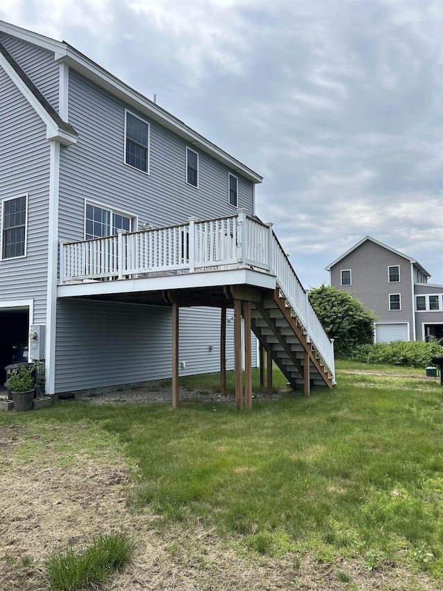 81 Cider St, Epping, NH 03042 - back of house featuring a deck, a yard, and stairs