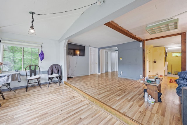 236 N Main St, Franklin, NH 03235 - living area featuring wood finished floors and arched walkways