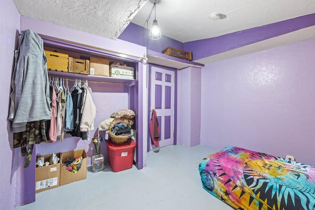 236 N Main St, Franklin, NH 03235 - bedroom featuring a closet and concrete floors