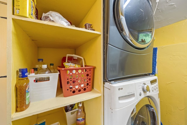 236 N Main St, Franklin, NH 03235 - washroom featuring stacked washer and clothes dryer