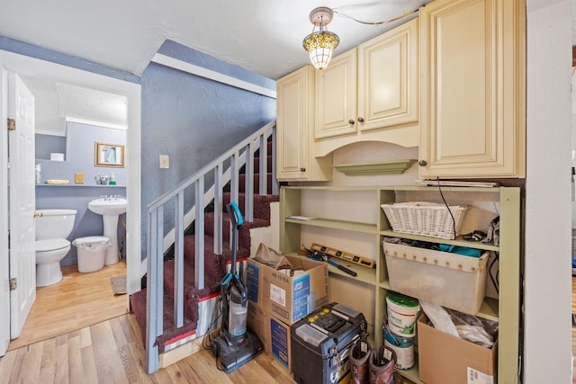 236 N Main St, Franklin, NH 03235 - staircase featuring wood finished floors