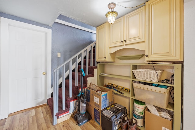 236 N Main St, Franklin, NH 03235 - staircase with wood finished floors