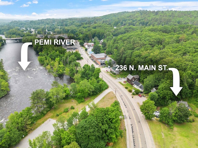 236 N Main St, Franklin, NH 03235 - bird's eye view of a heavily wooded area