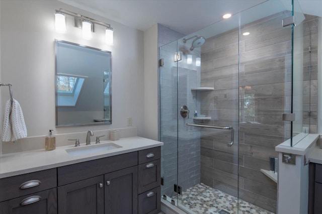 36 Lower Iv Unit 48A, Ludlow, VT 05149 - full bath with a skylight, vanity, and a stall shower