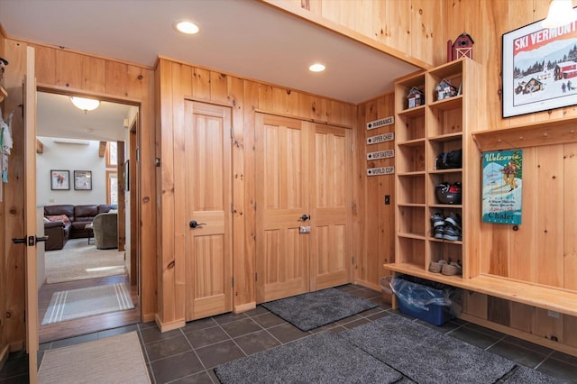 36 Lower Iv Unit 48A, Ludlow, VT 05149 - mudroom featuring dark tile patterned flooring, wooden walls, and recessed lighting