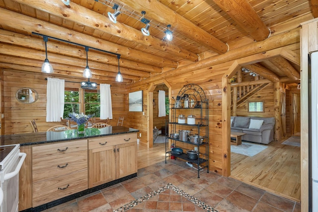 203 Orris Rd, Thornton, NH 03285 - kitchen featuring white electric range, a wood ceiling with exposed beams, light brown cabinetry, hanging light fixtures, and wooden walls