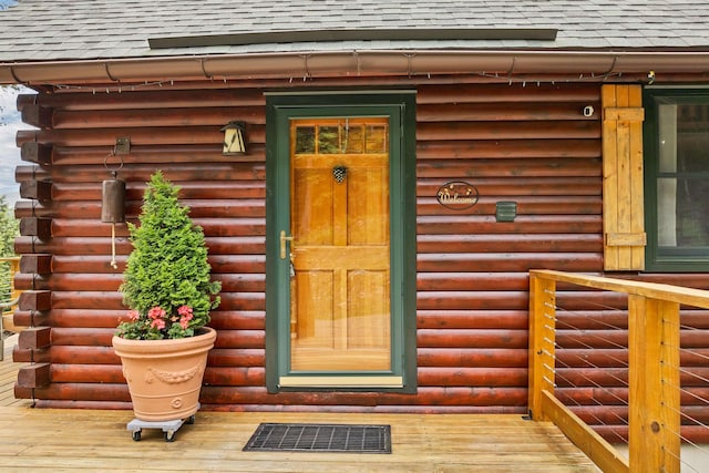 203 Orris Rd, Thornton, NH 03285 - doorway to property featuring a shingled roof and log siding