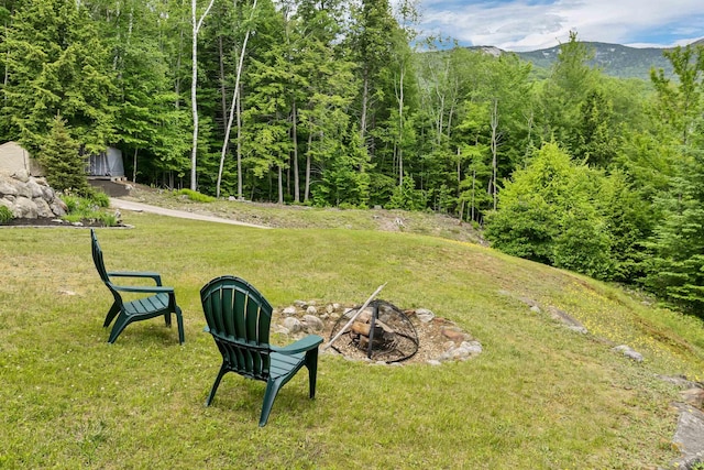 203 Orris Rd, Thornton, NH 03285 - view of green lawn featuring a mountain view and a wooded view