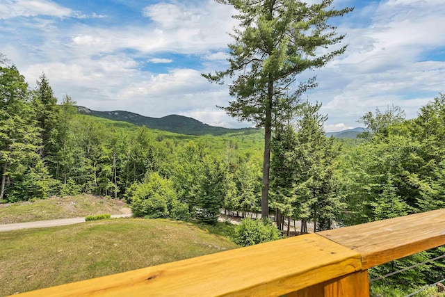 203 Orris Rd, Thornton, NH 03285 - view of mountain backdrop featuring a heavily wooded area