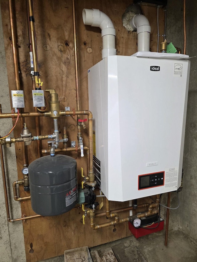 142 Sugar Plum Ct, Randolph, VT 05060 - utility room featuring water heater