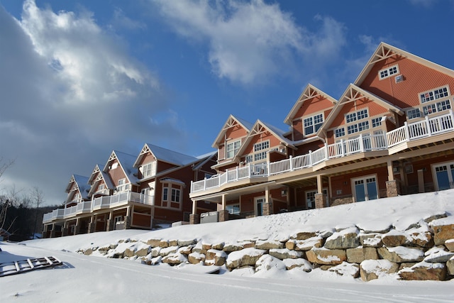 3B Freestyle Cir, Dover, VT 05356 - view of front of house with stone siding, a residential view, and a wooden deck
