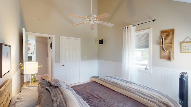 501 Bean Hill Rd Unit 32, Northfield, NH 03276 - bedroom with a wainscoted wall and a high ceiling