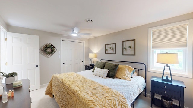 501 Bean Hill Rd Unit 32, Northfield, NH 03276 - bedroom featuring a closet, light colored carpet, and a ceiling fan