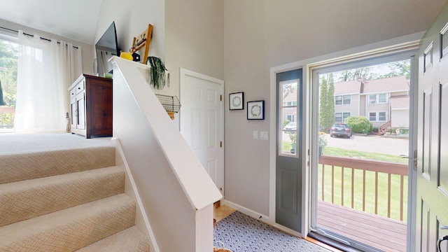 501 Bean Hill Rd Unit 32, Northfield, NH 03276 - foyer entrance with stairs and a high ceiling